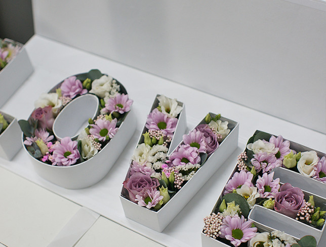 Box "LOVE" with white eustoma and roses photo
